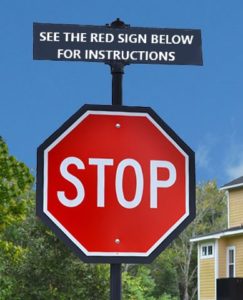 directional language above a stop sign